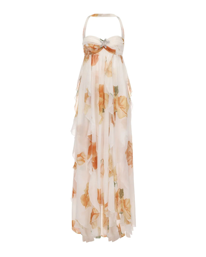 Long floral dress with a bow detail on a white background