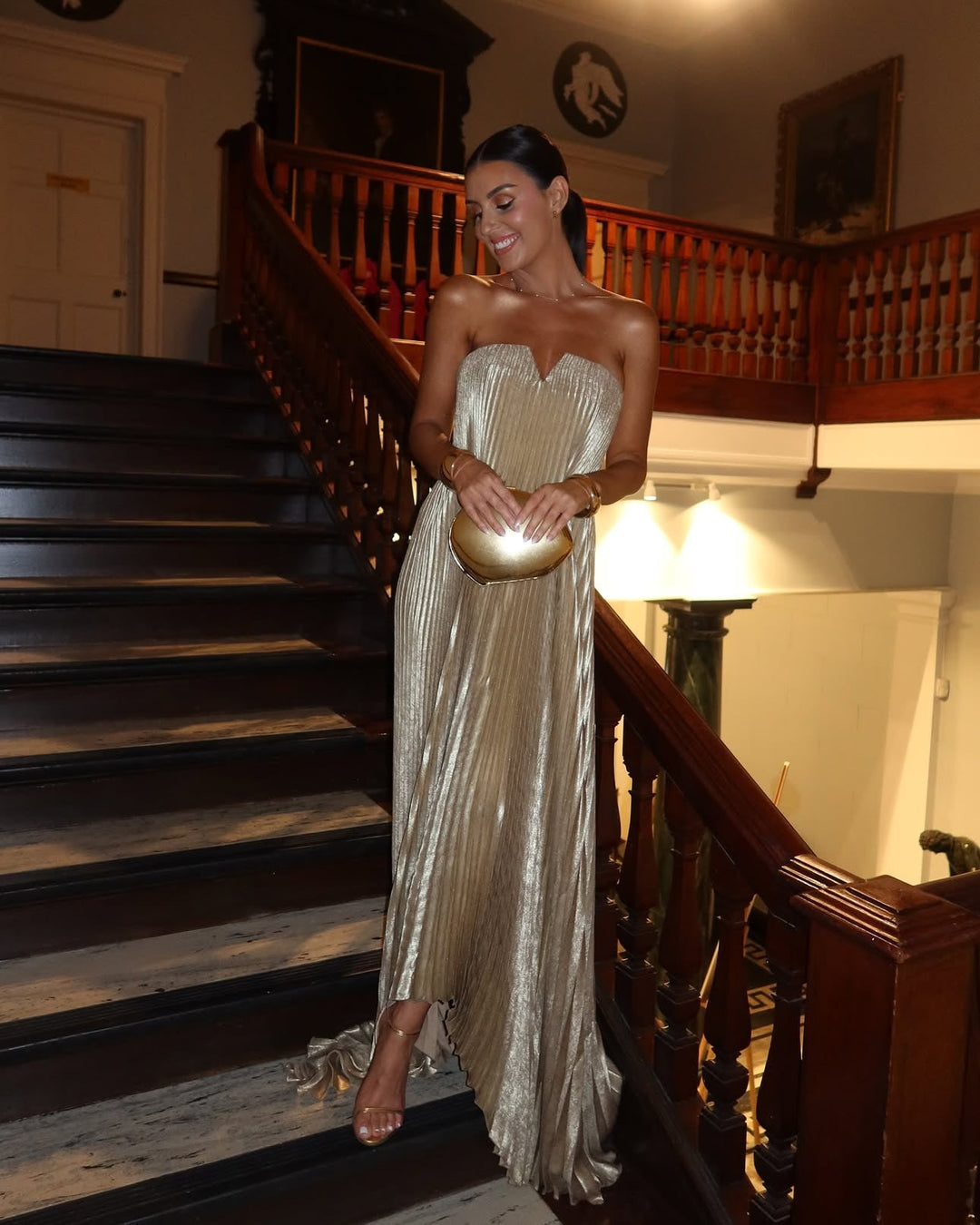 Elegant golden evening gown perfect for beach weddings or summer events