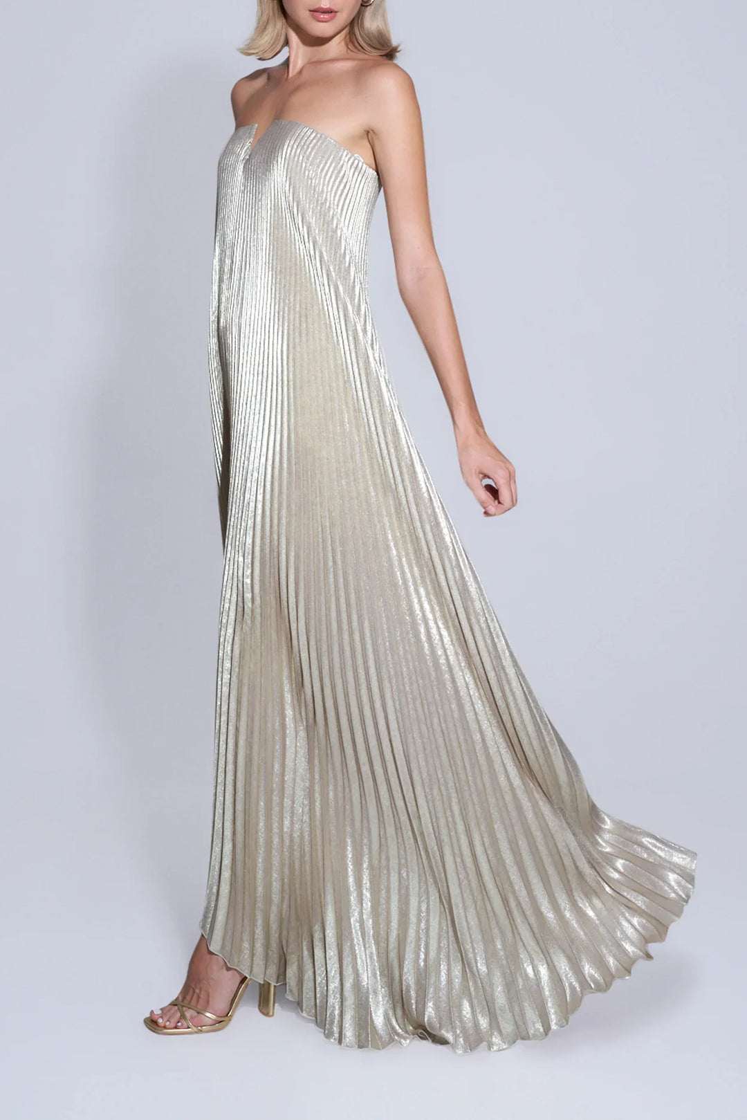 Flowy gold summer dress with breathable fabric and draped silhouette