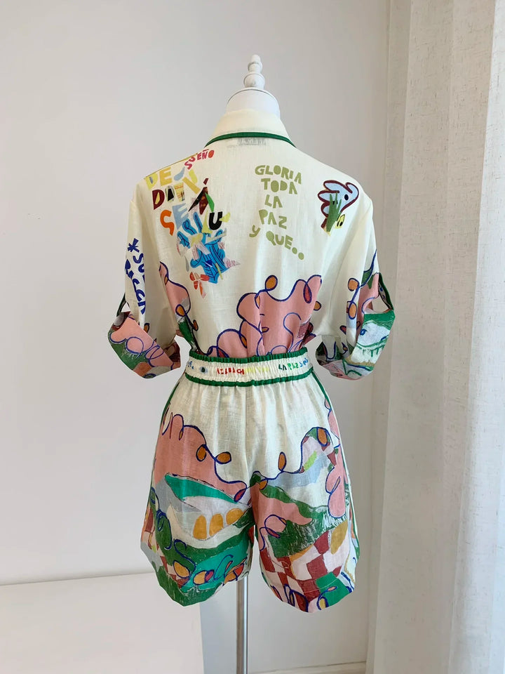 Colorful outfit with teddy bear design on a mannequin against a white background