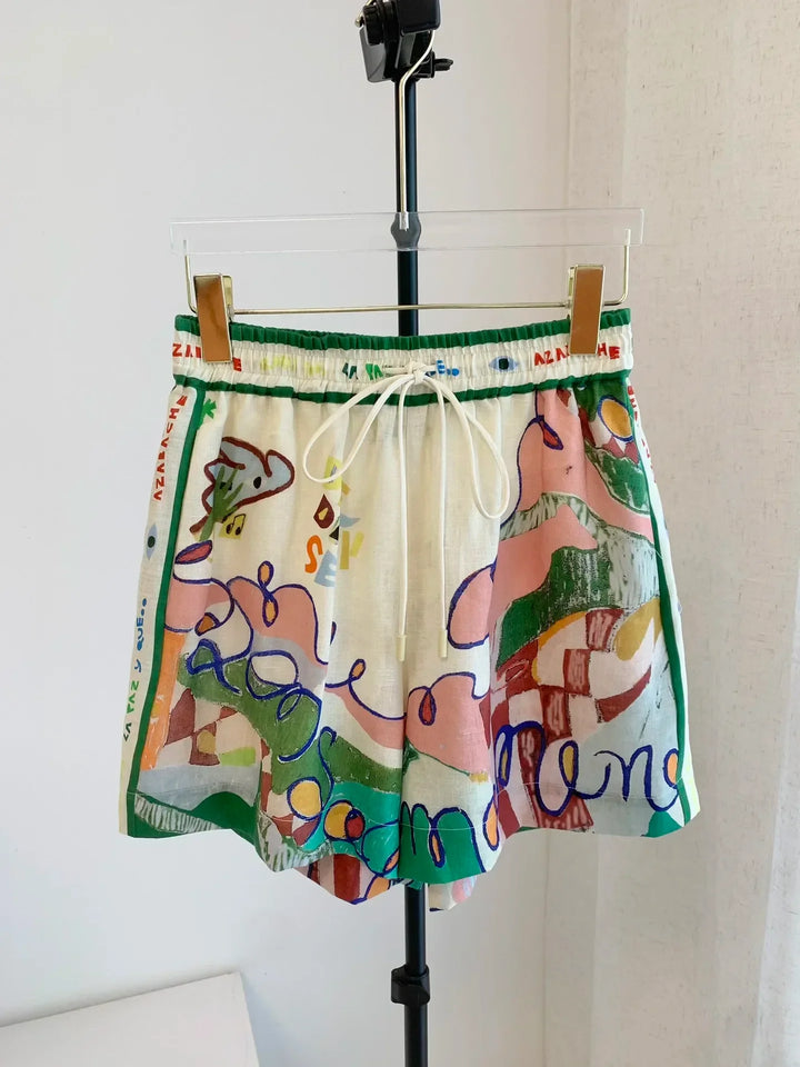 Colorful skirt with abstract designs and text on a mannequin against a white background