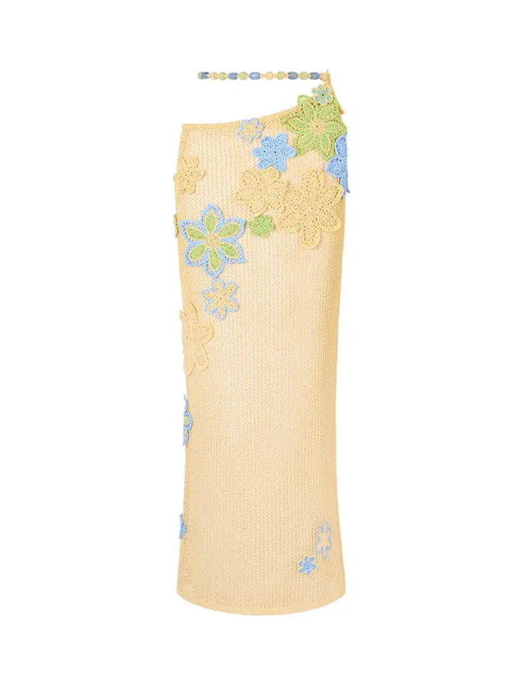 Yellow dress with floral patterns on a white background