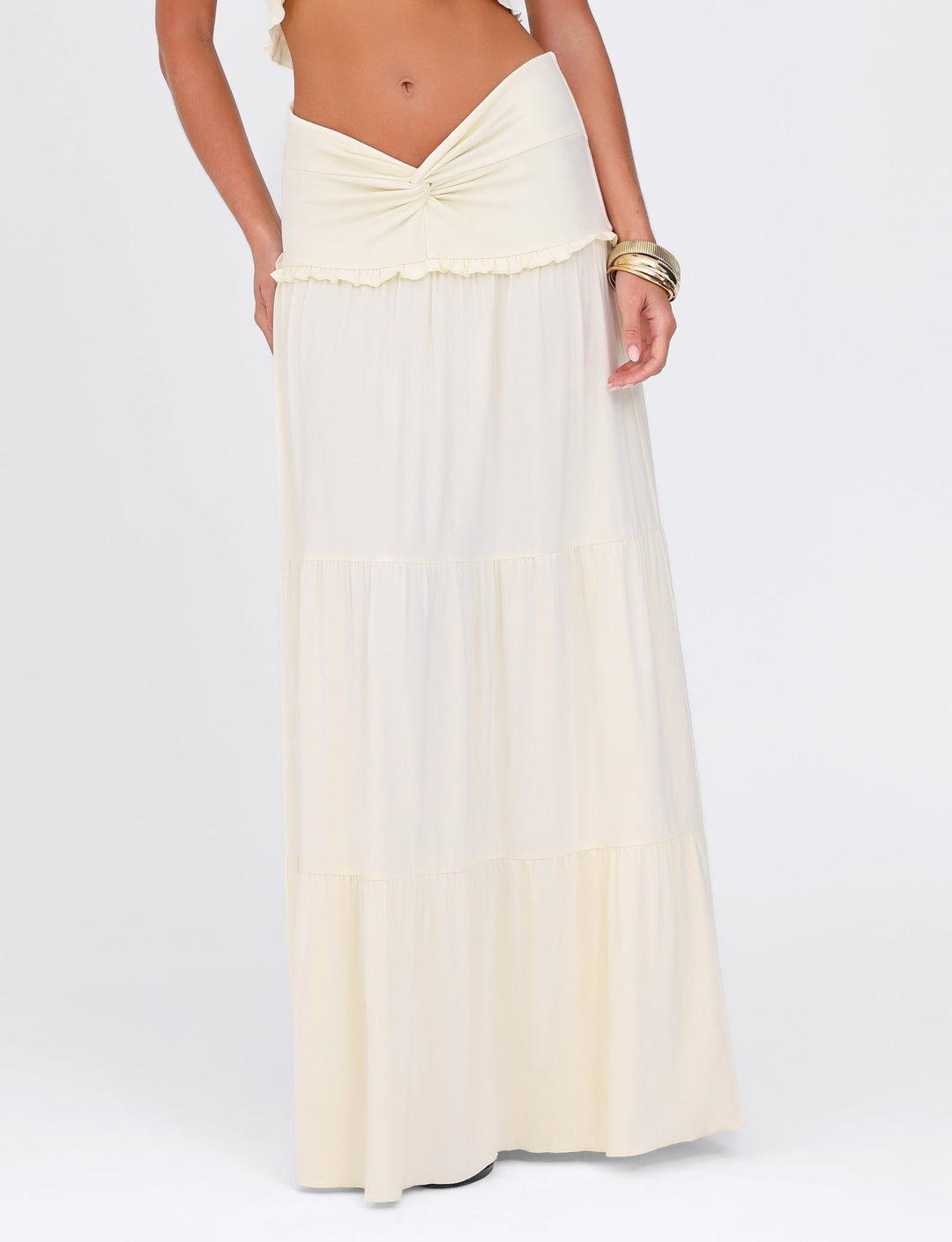 White dress with a bow detail on a white background
