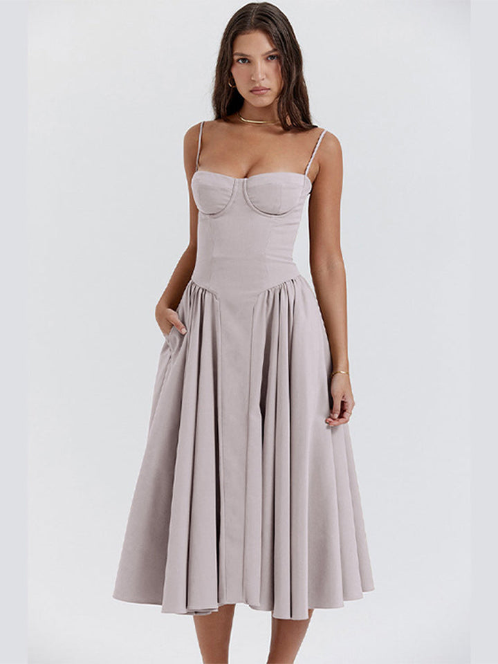 Woman wearing a light purple dress on a white background