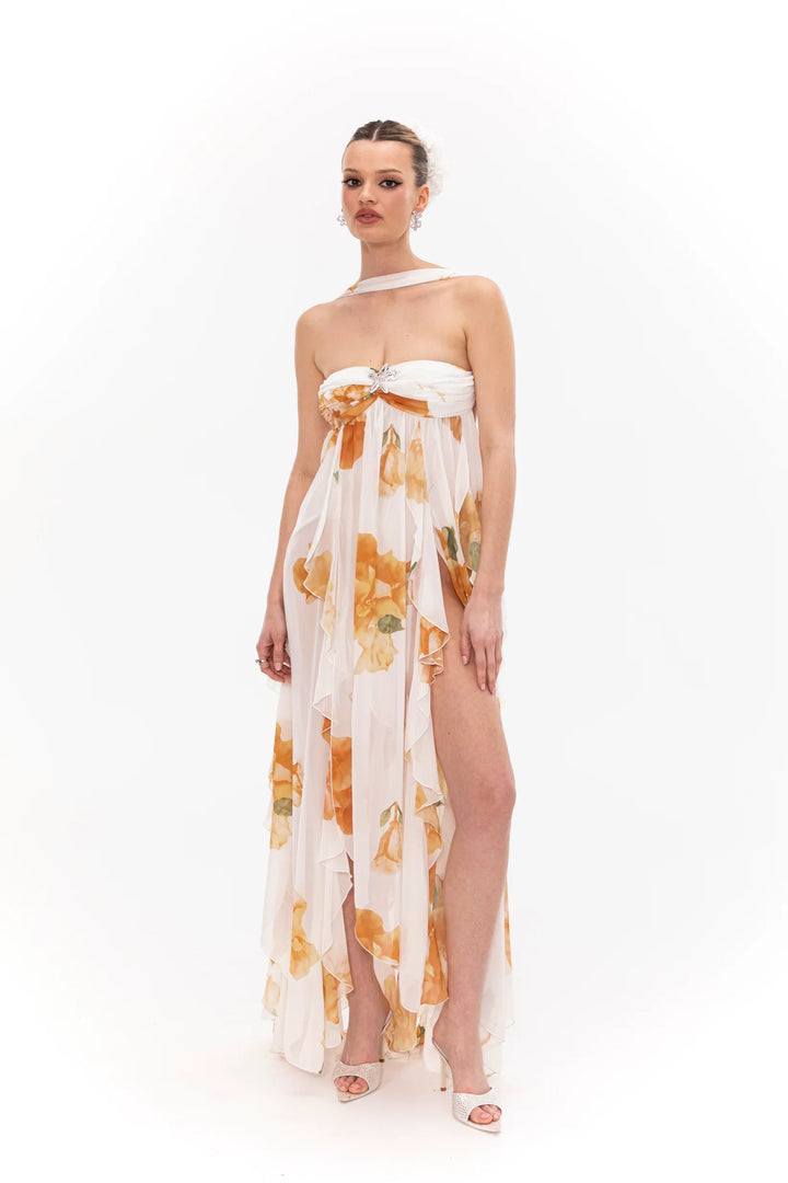 Woman wearing a floral dress on a white background