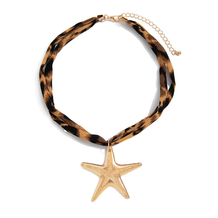 Necklace with tortoiseshell pattern and gold starfish pendant on a white background